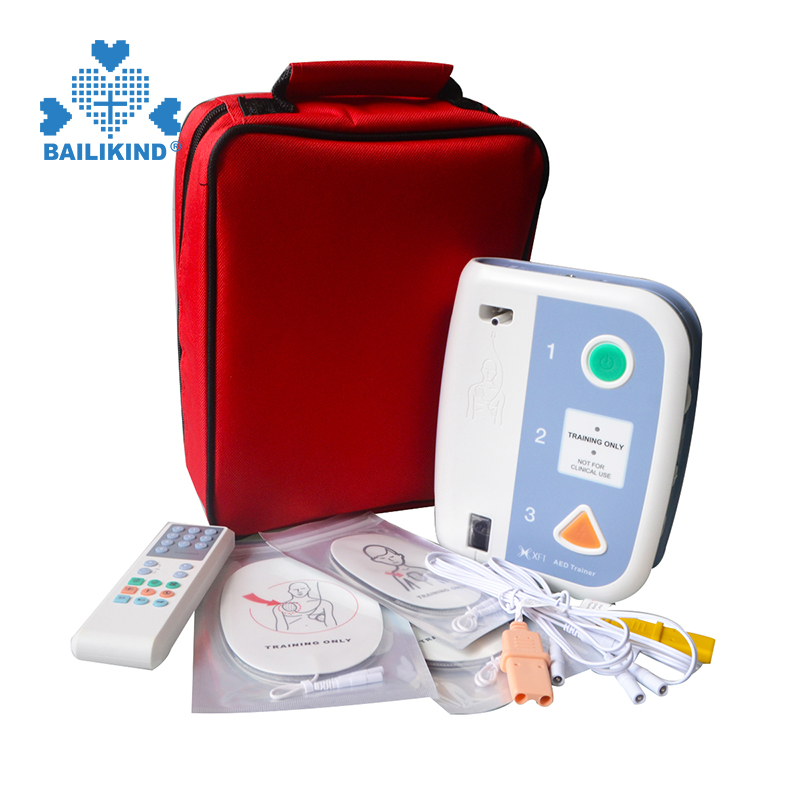 Otu esi eji AED Trainer Automated Mpụga Defibrillator Nkuzi Ọzụzụ Enyemaka Mbụ Maka Ngwa Nkuzi Asụsụ Abụọ nke Ụlọ Akwụkwọ CPR